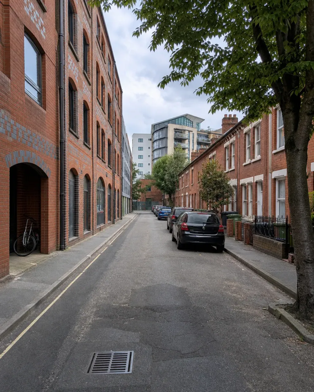 A quiet street off Reading town centre, warehouse-style flats facing a Victorian terrace